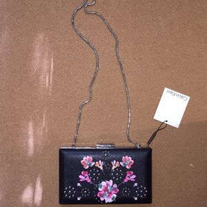 Calvin Klein clasped clutch with strap